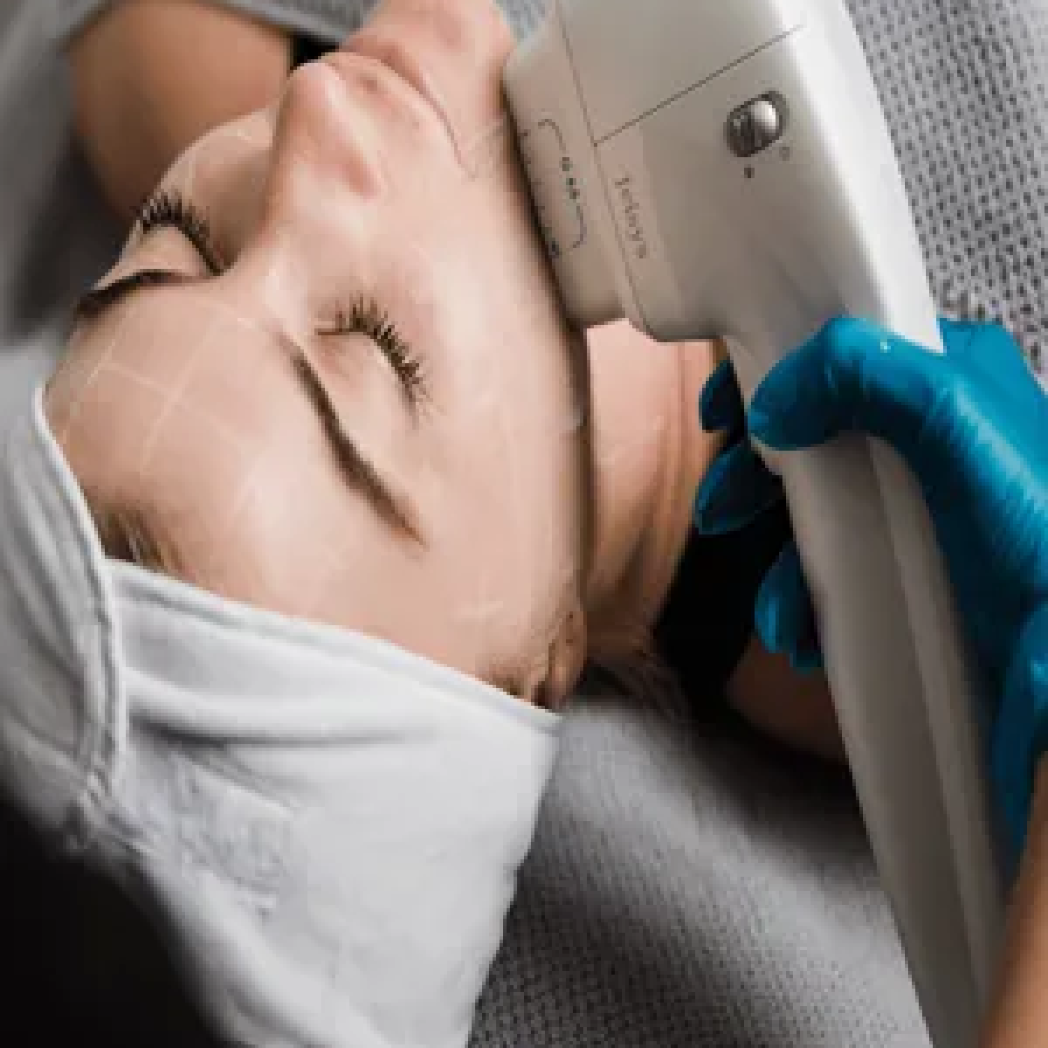 Woman undergoing non-surgical facelift with HIFU treatment for skin tightening